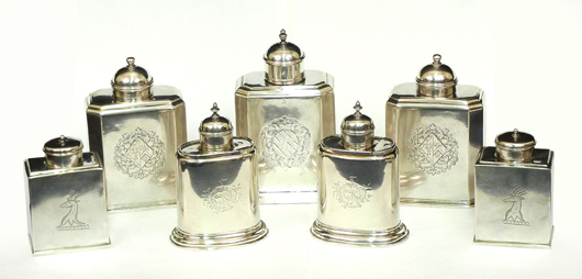 A formidable array of early 18th-century English sterling silver tea caddies. Stephenson’s Auctioneers image.